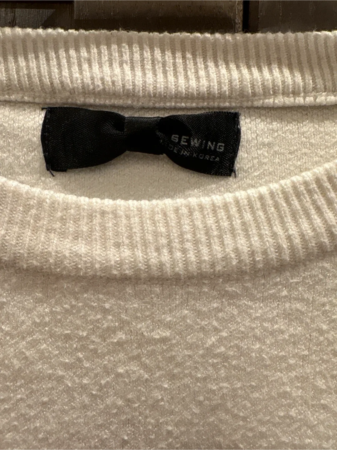 Sewing. Made in Korea. Cream Sweater image indicator(3)