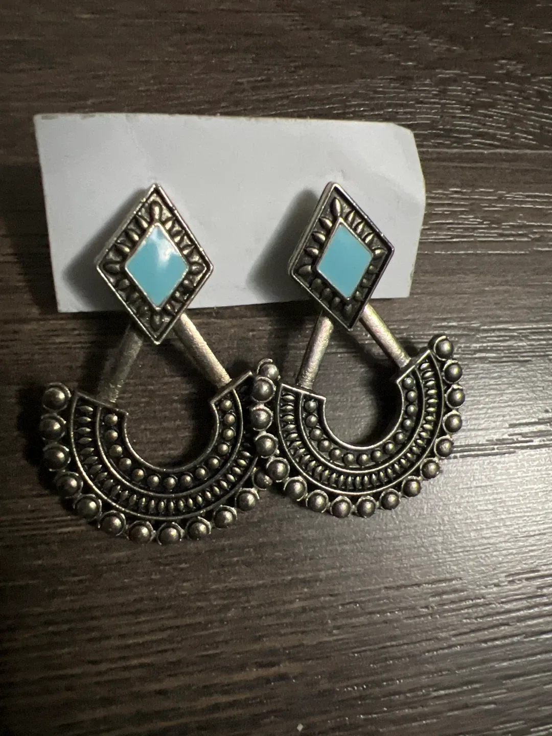 Silver Tone Earrings with Blue Stone
