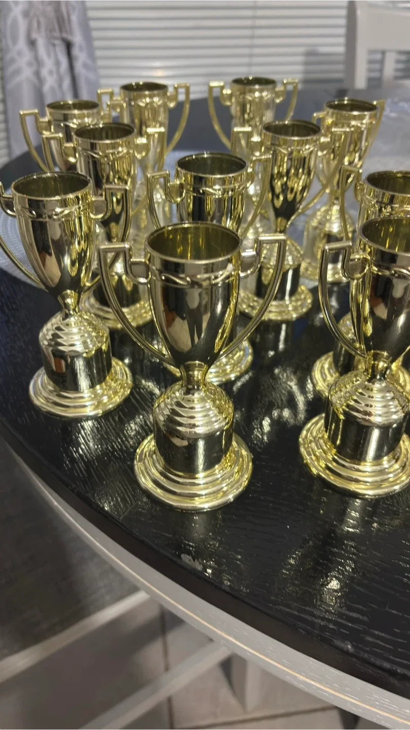 Gold Coloured Plastic Trophies image indicator(2)