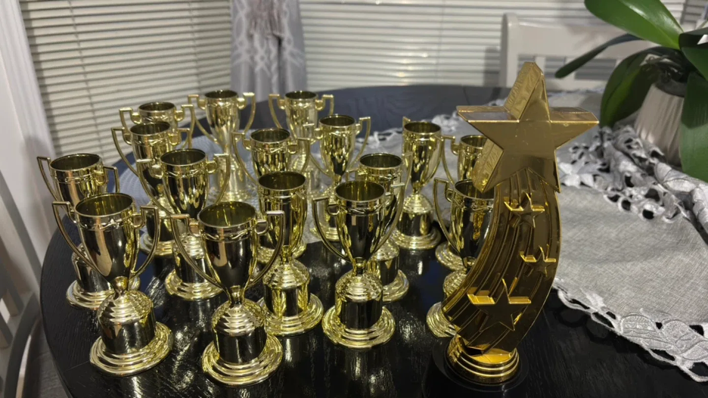 Gold Coloured Plastic Trophies image indicator(3)