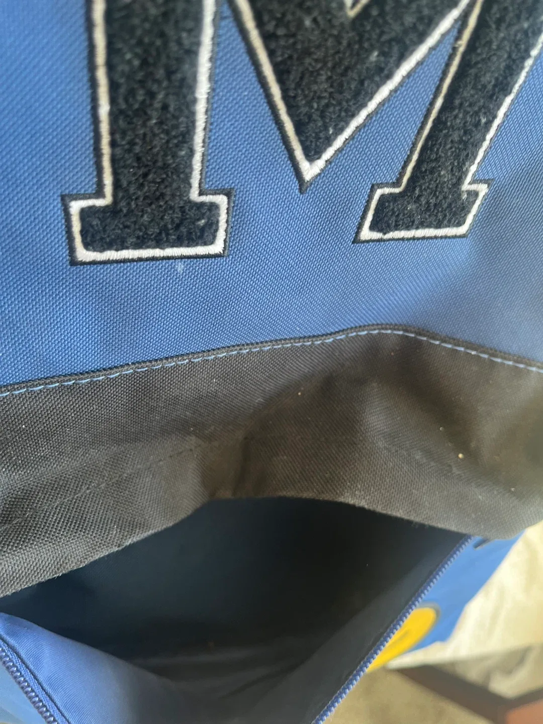 Blue Backpack with 'M' Patch image indicator(2)