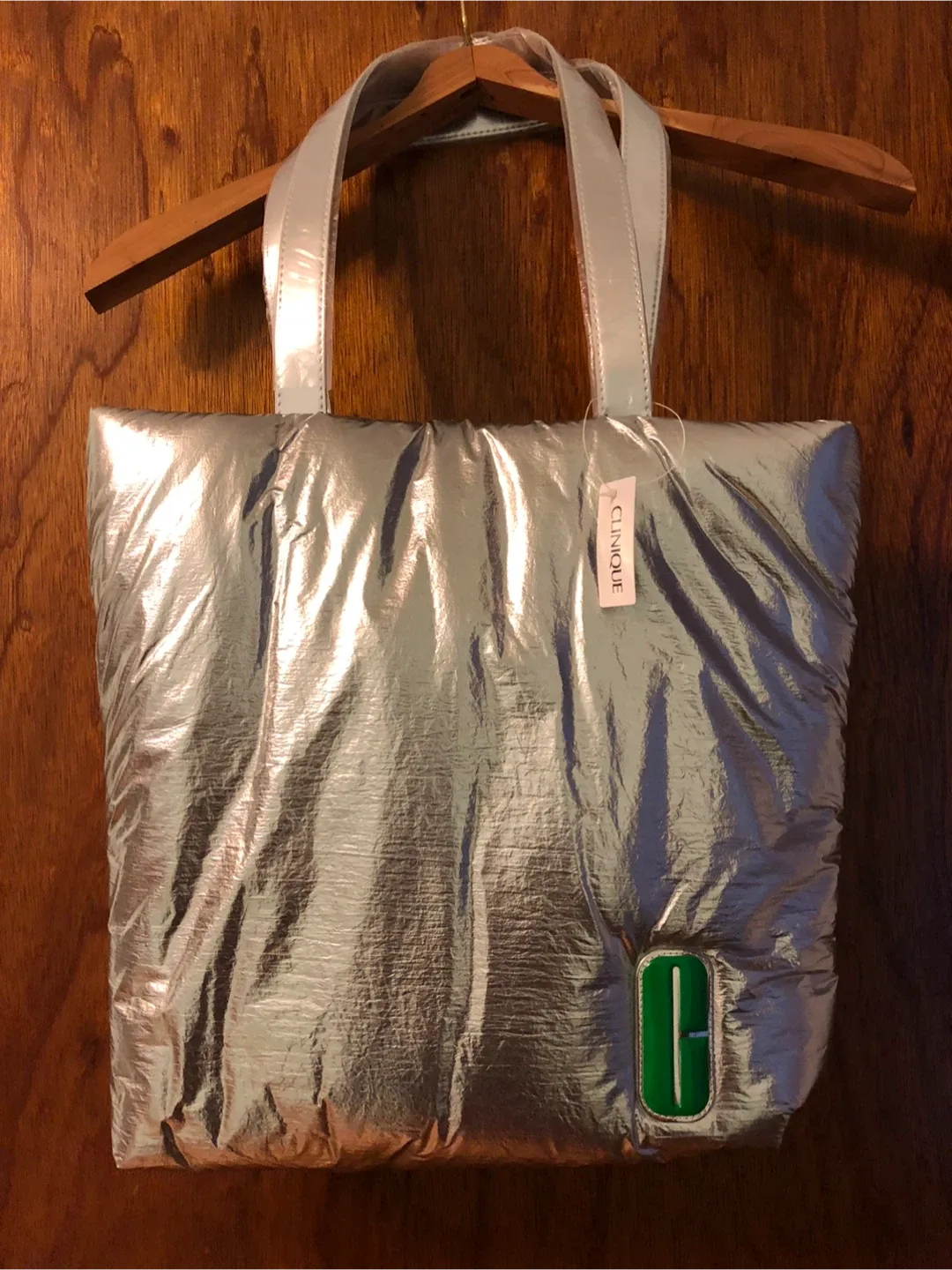 A New Clinique Silver Puffer Tote Bag image indicator(2)