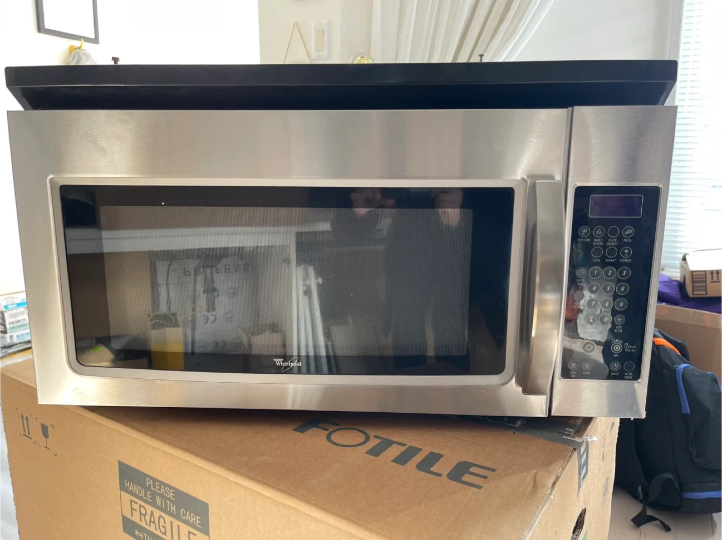 Whirlpool Stainless Steel Over-the-Range Microwave image indicator(3)