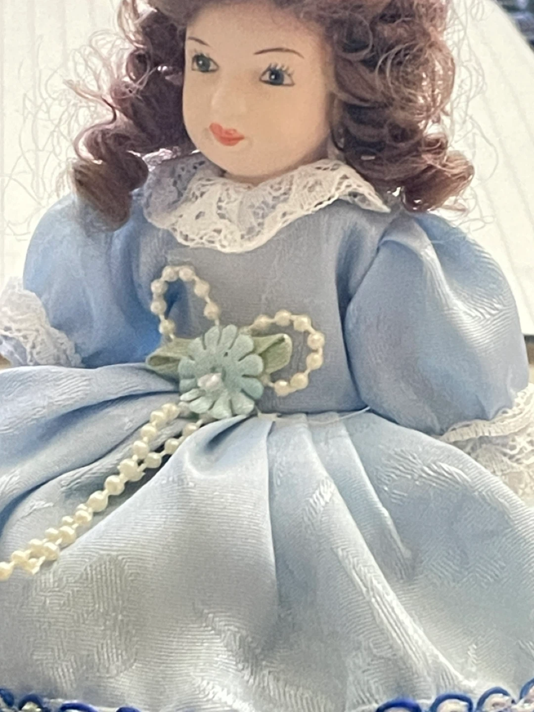 Porcelain Doll in Blue Dress