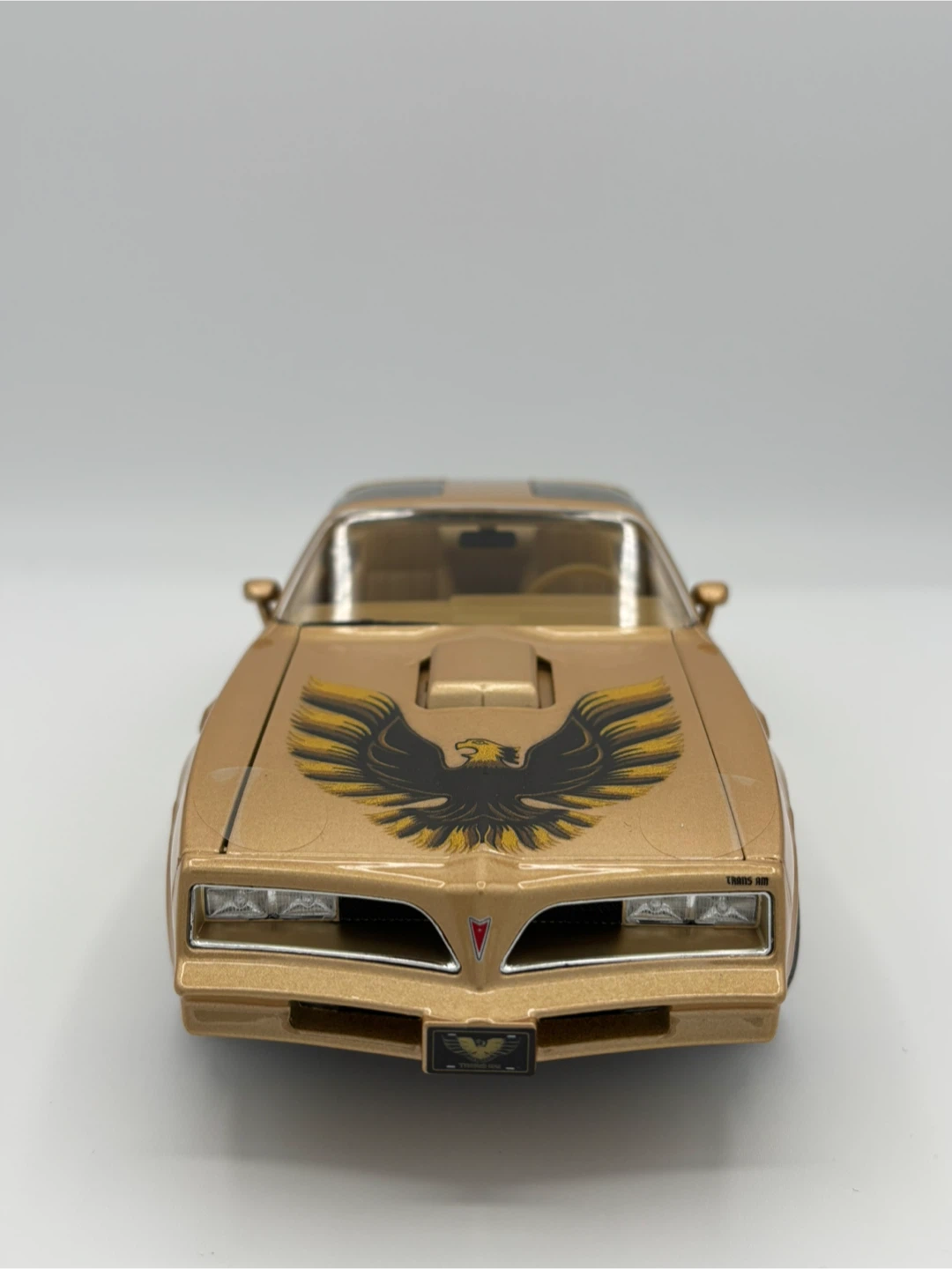 Gold 1977 Pontiac Trans Am Diecast Model