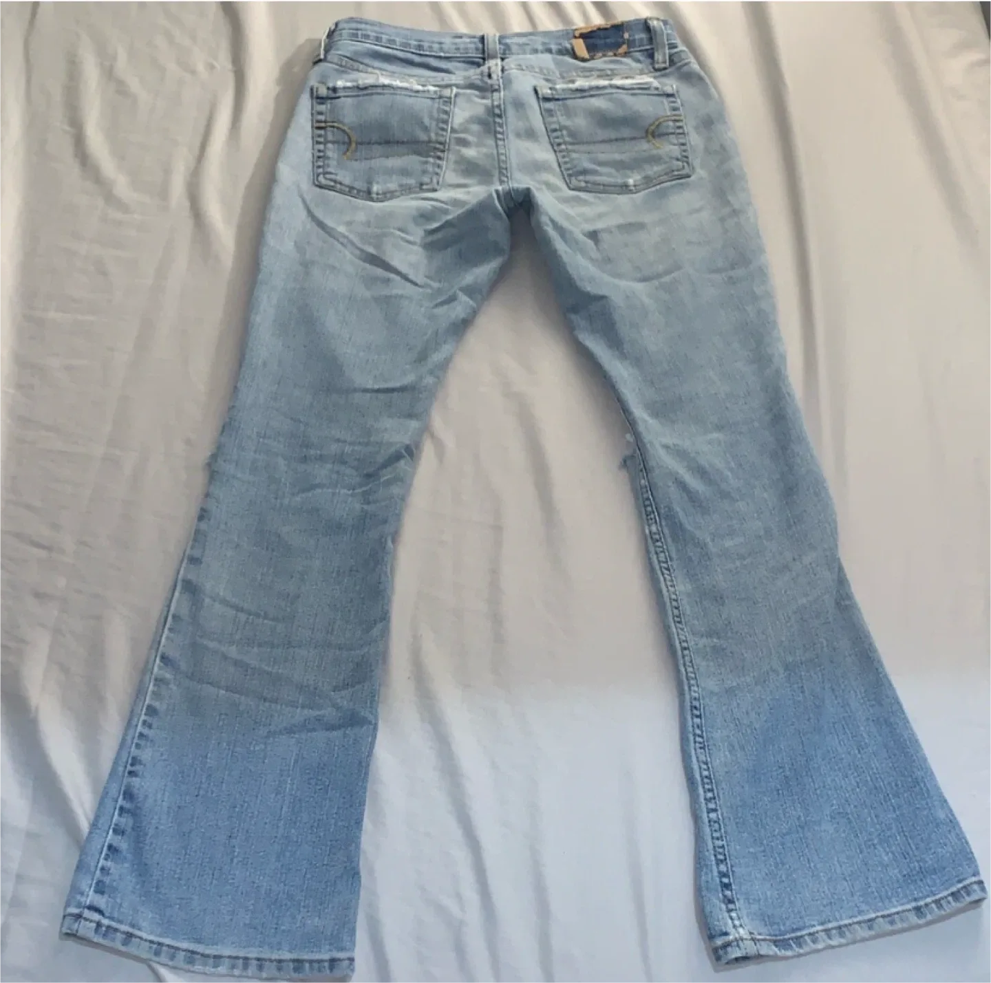 American Eagle Ripped Flare Jeans image indicator(3)