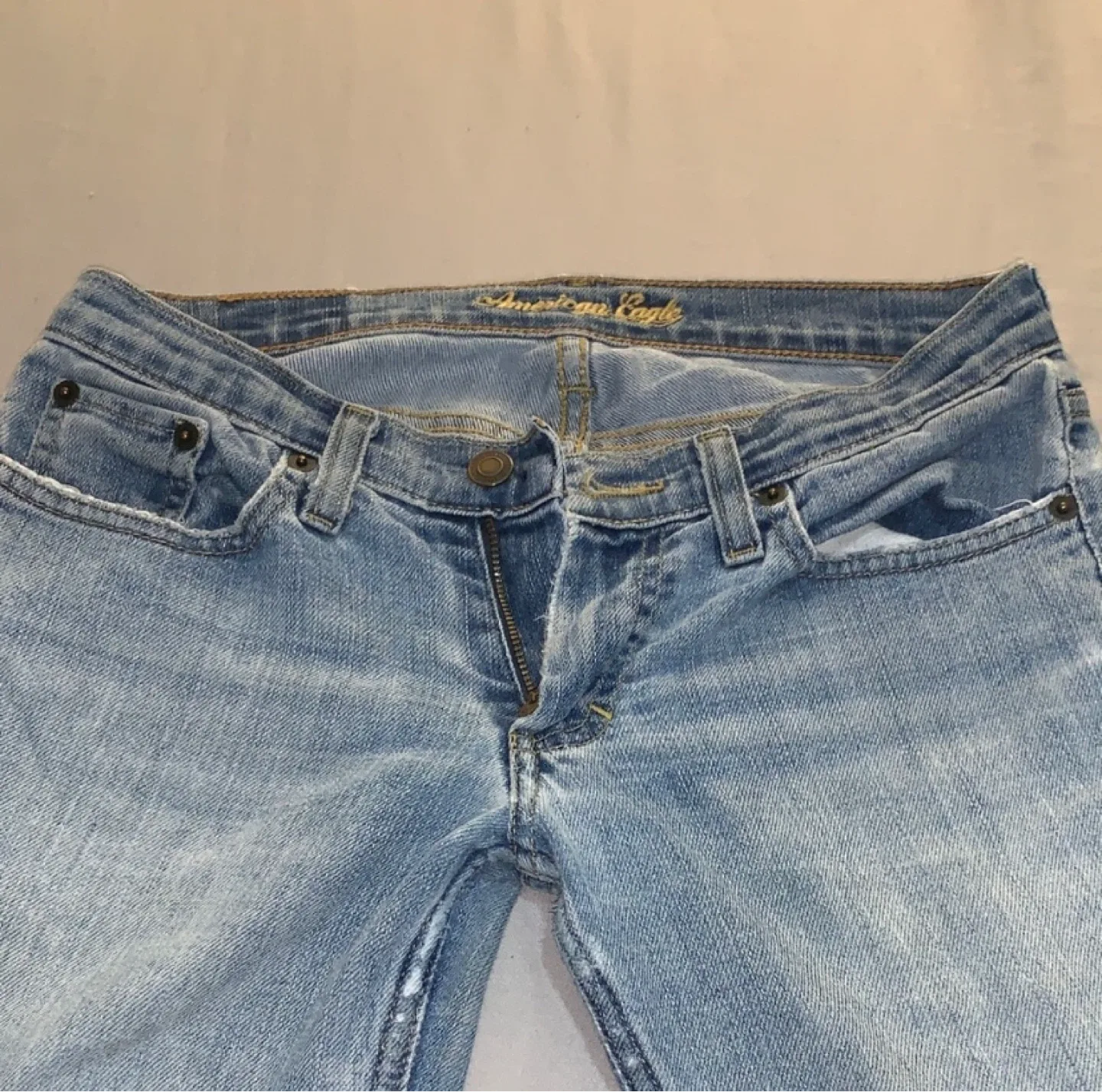American Eagle Ripped Flare Jeans image indicator(4)