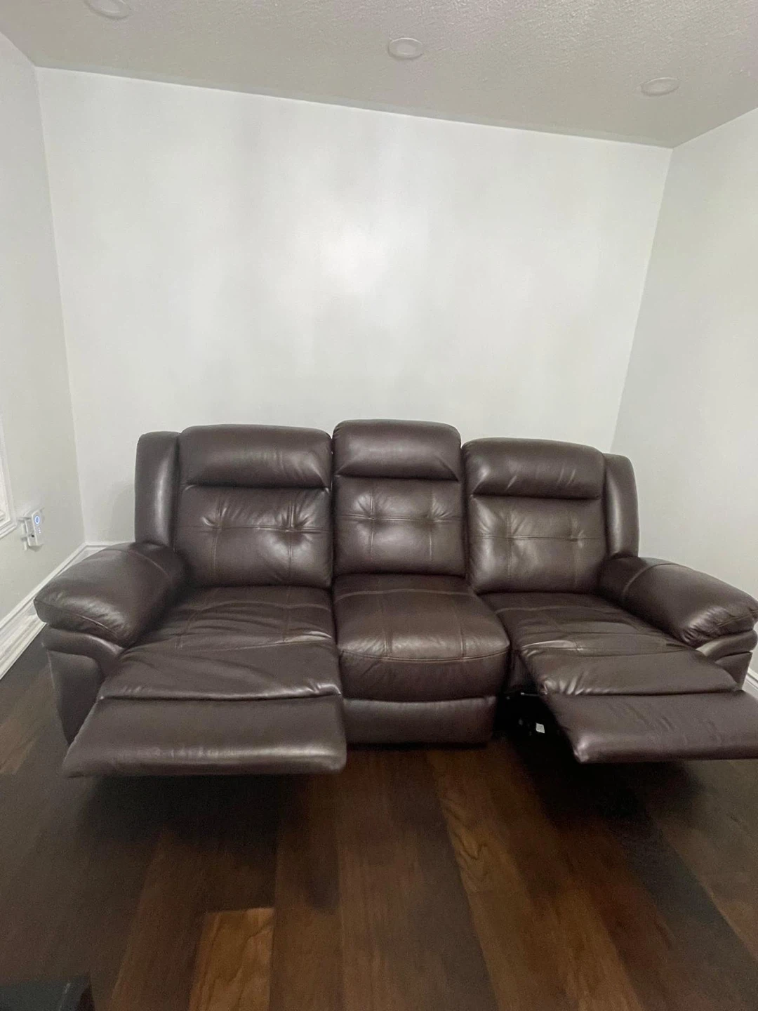 Cooper Leather Reclining Sofa .