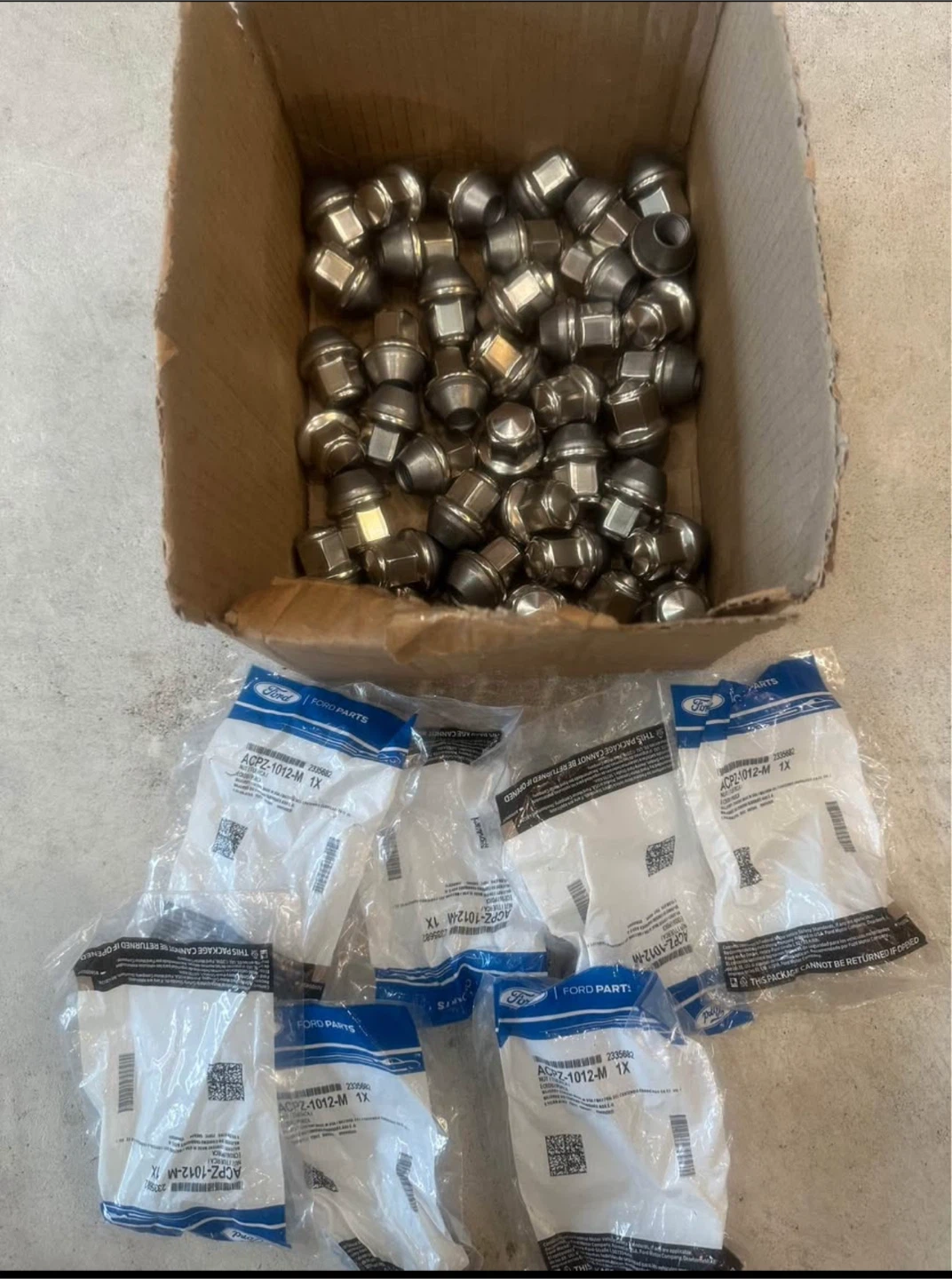 20 (1 complete set) OEM Lug Nuts - Brand New