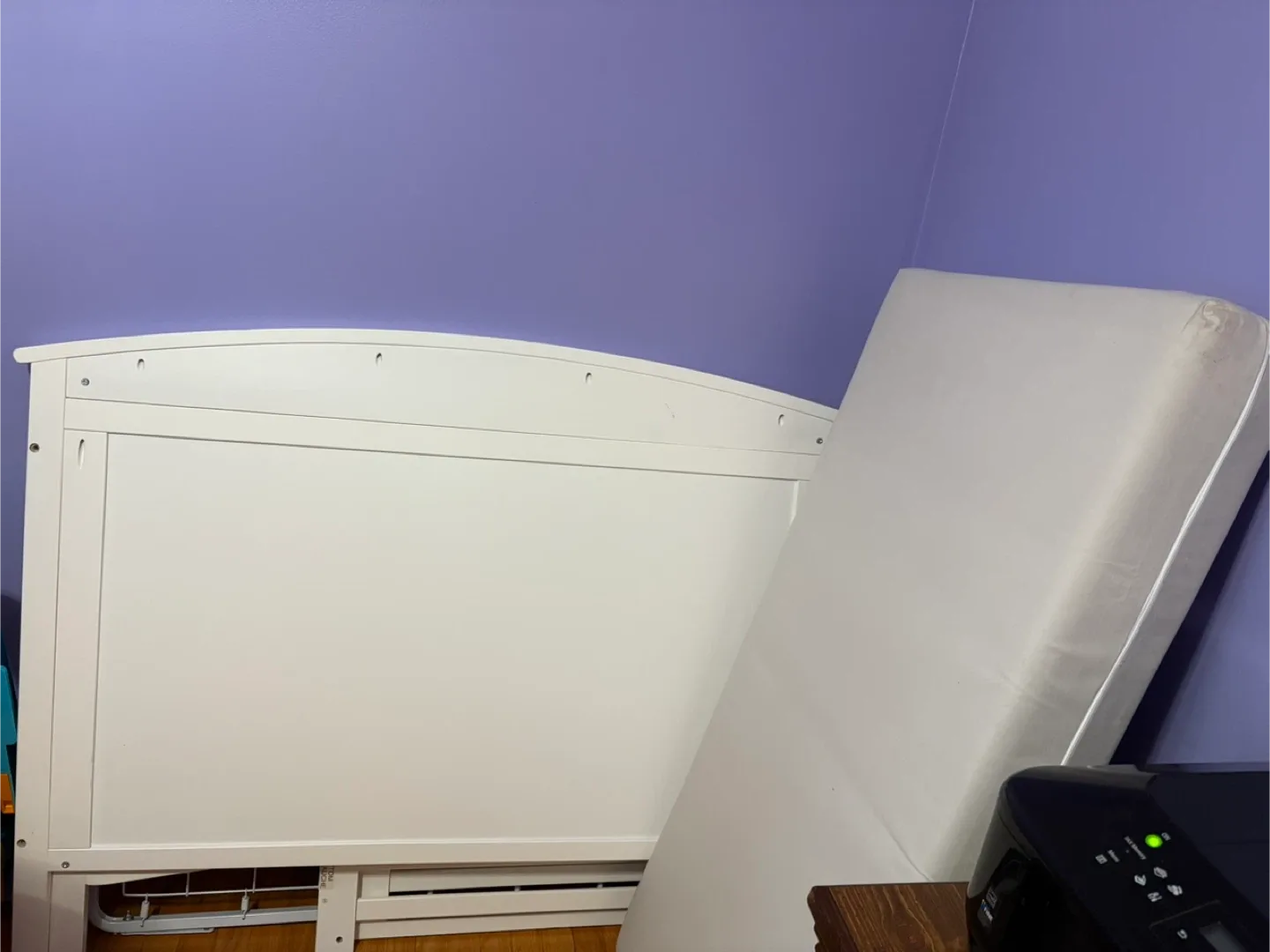 White toddlers bed and mattress. thumbnail
