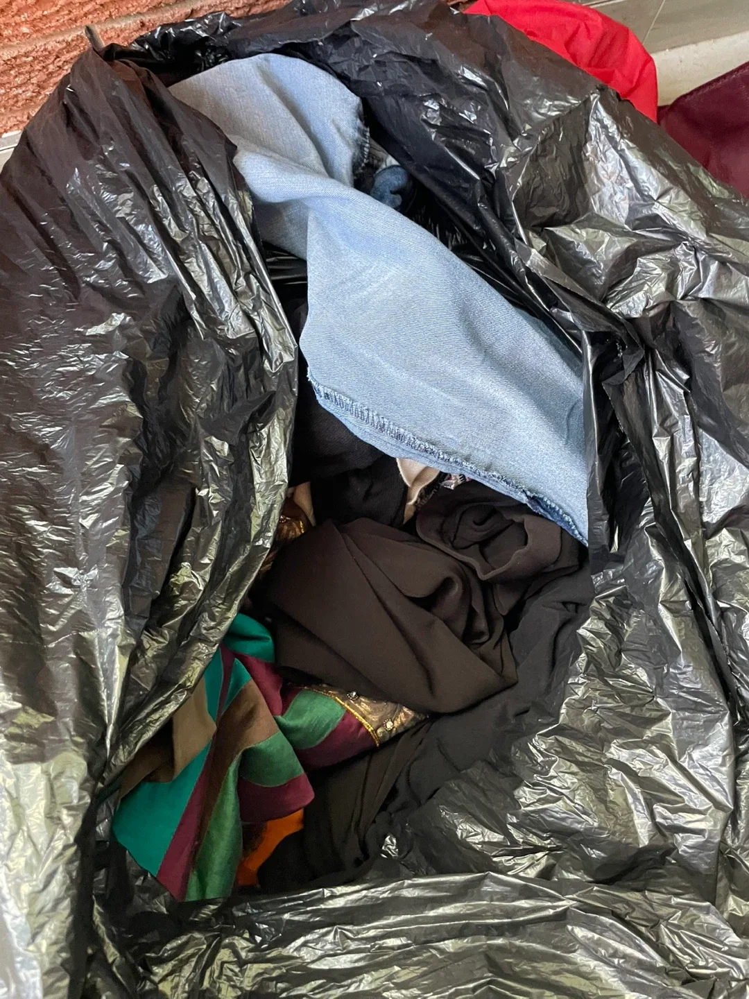 Big bag with women’s clothes thumbnail