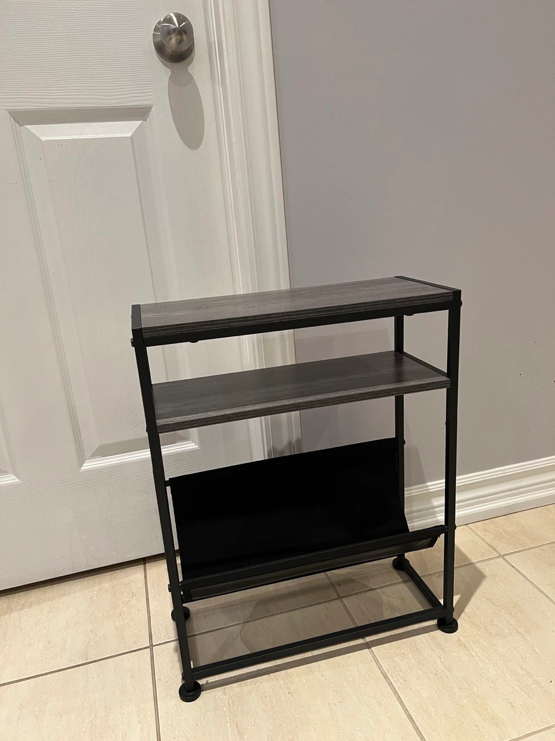 Black Metal Frame Magazine Rack
