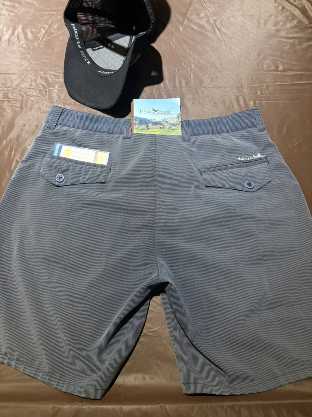 Travis Mathew size 36 Shorts 110 Flexfit Hat priced per each. image indicator(3)