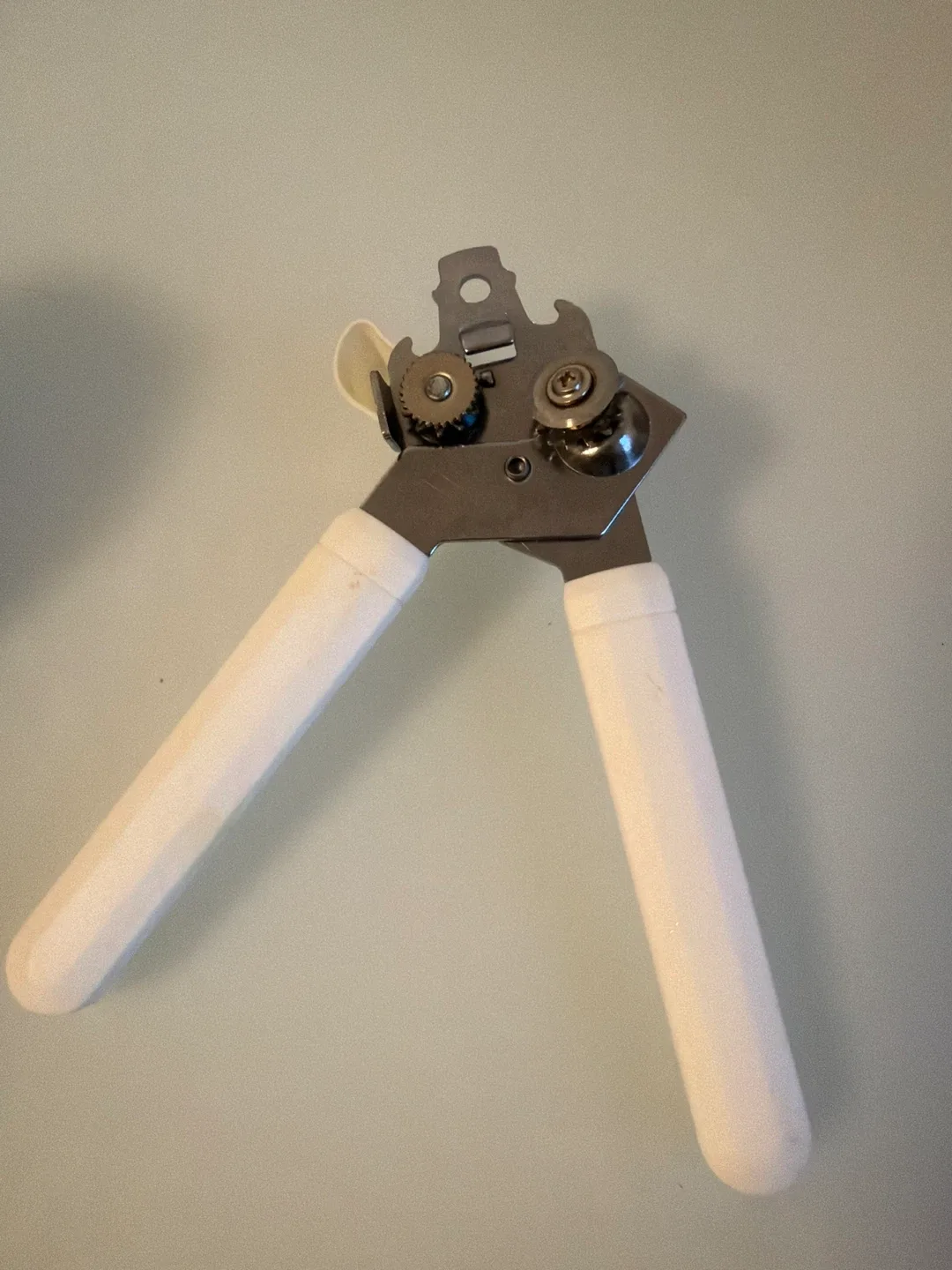 Vintage Can Opener with White Handles thumbnail