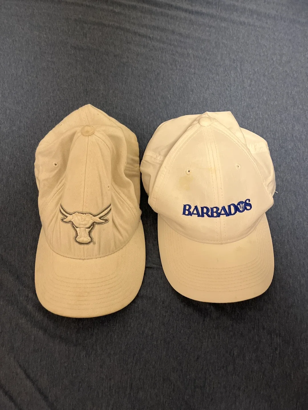Two Baseball Caps - NCAA & Barbados thumbnail