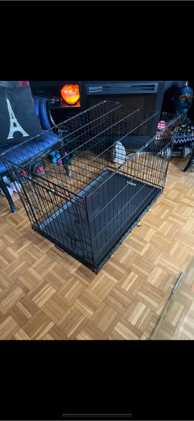 Large Dog Crate - sliding tray. Also have small cage for sale image indicator(4)