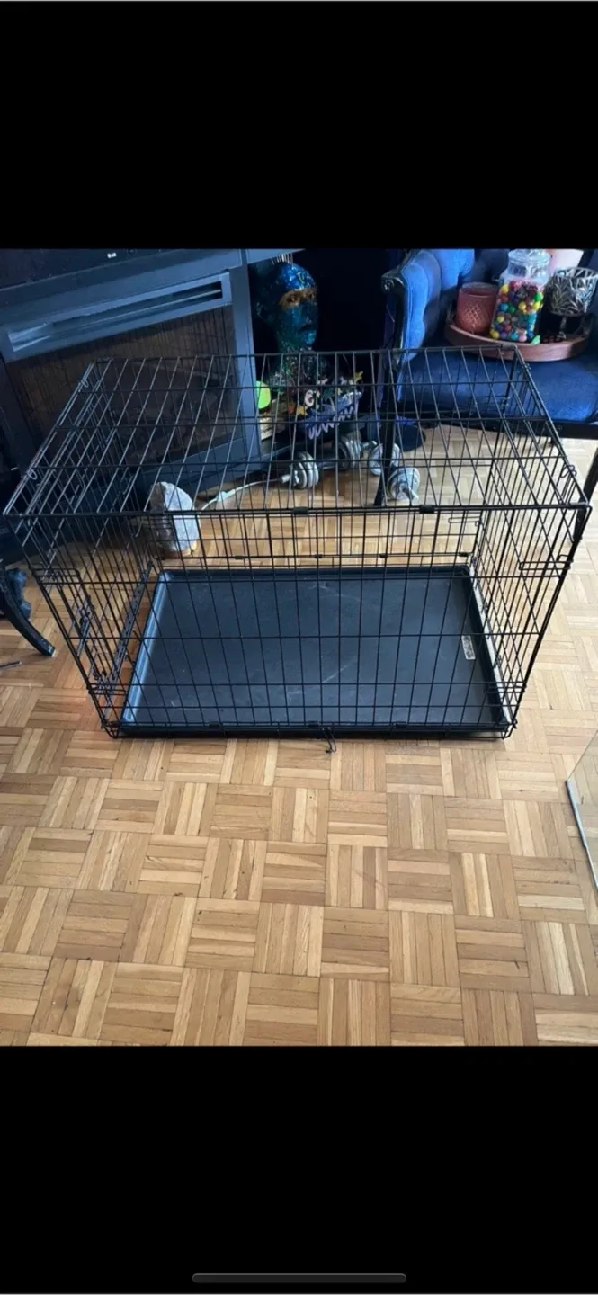 Large Dog Crate - sliding tray. Also have small cage for sale image indicator(3)
