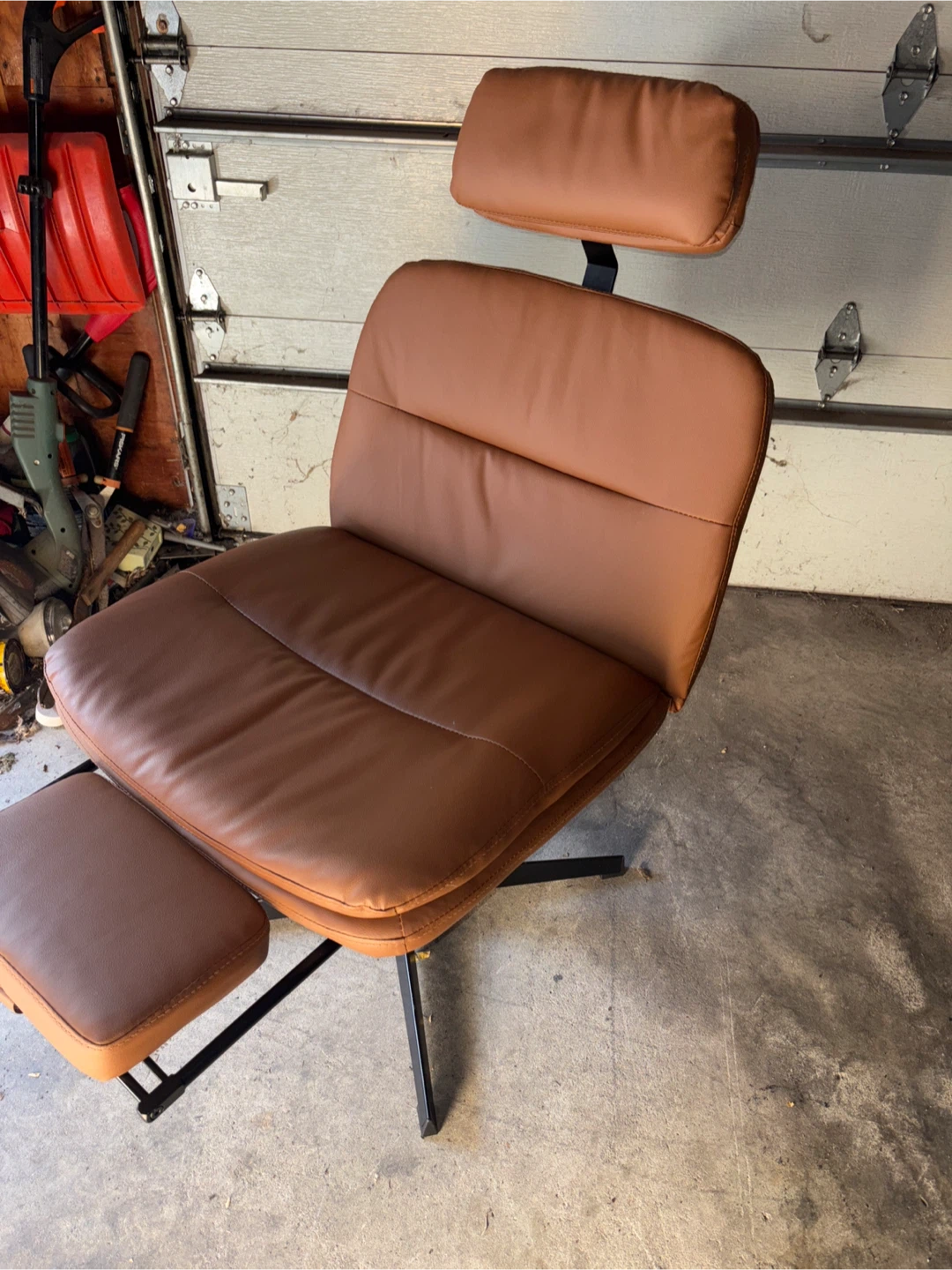 1 leather chair with attached ottoman