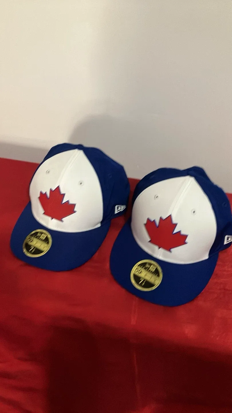 Toronto Blue Jays (2 Matching Hats) $35 EACH- Size 7 1/4 image indicator(2)