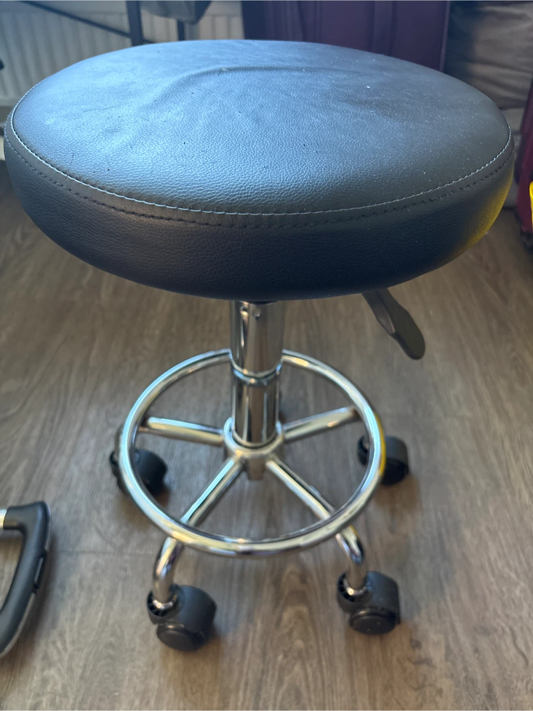 Black Rolling Swivel Stool