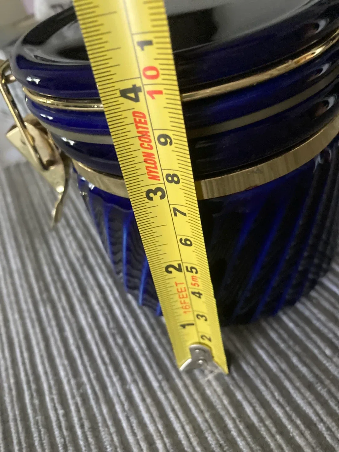 Blue jar with gold trim image indicator(3)