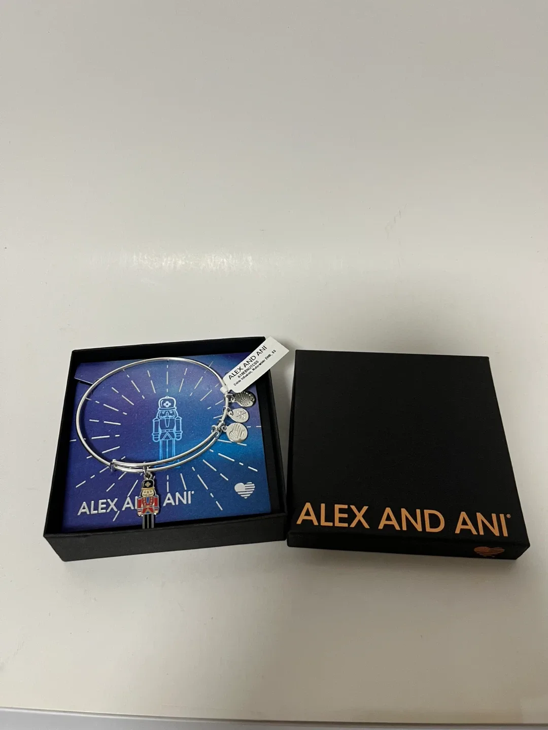 ALEX and ANI Nutcracker Expandable Bangle Bracelet w Charms image indicator(3)