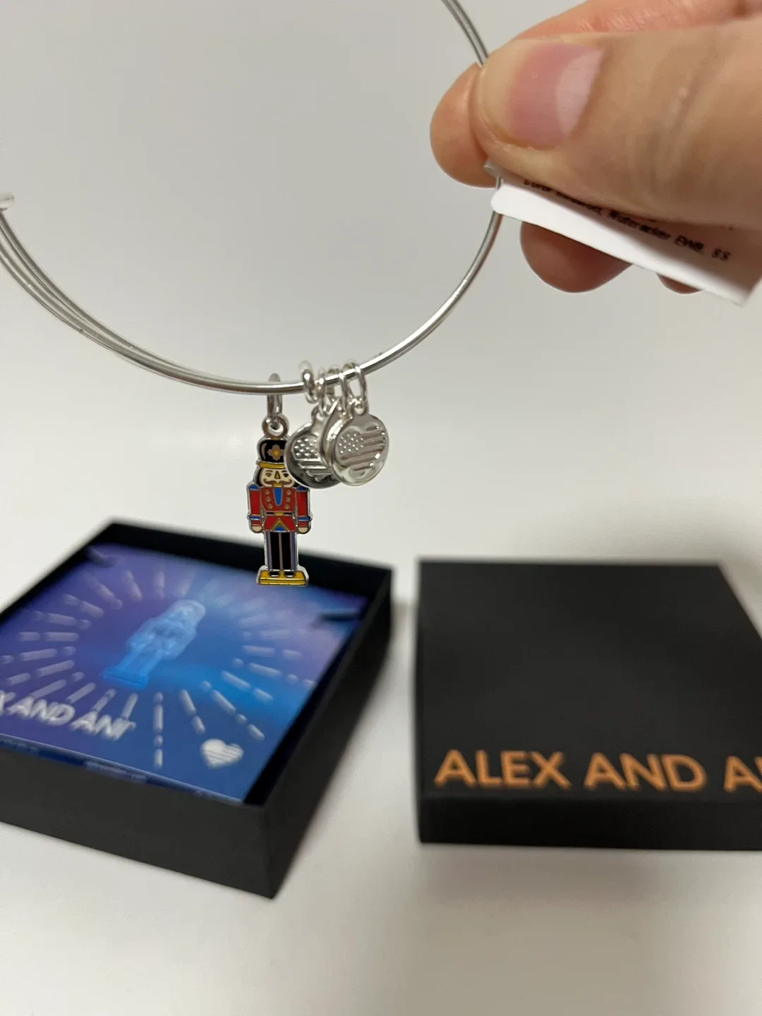 ALEX and ANI Nutcracker Expandable Bangle Bracelet w Charms image indicator(4)