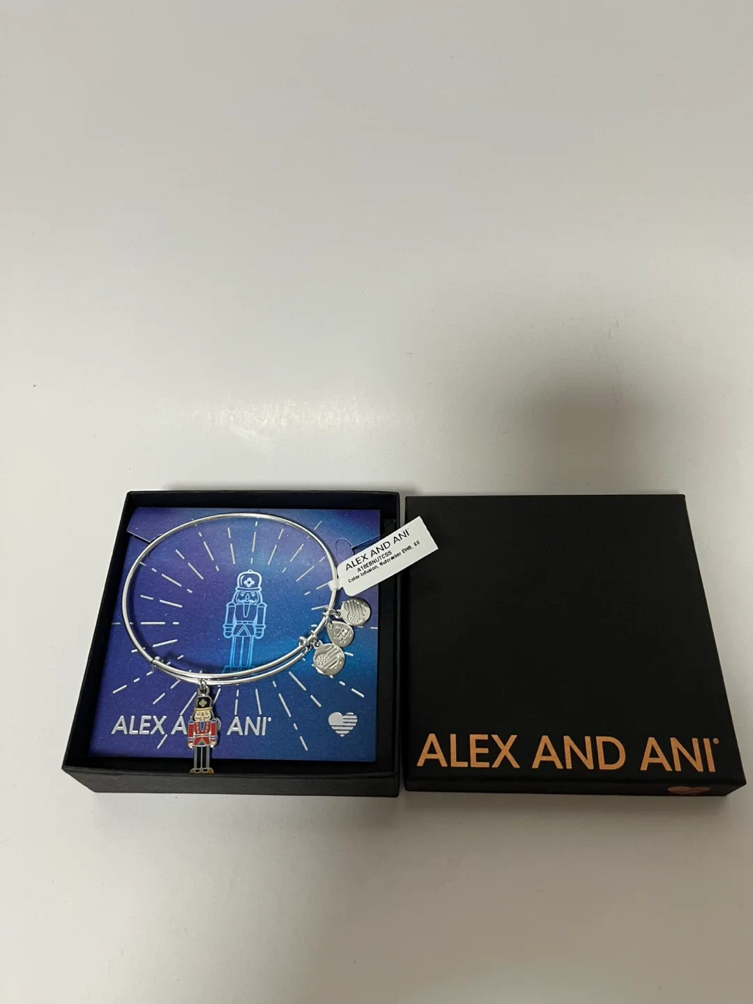 ALEX and ANI Nutcracker Expandable Bangle Bracelet w Charms image indicator(2)