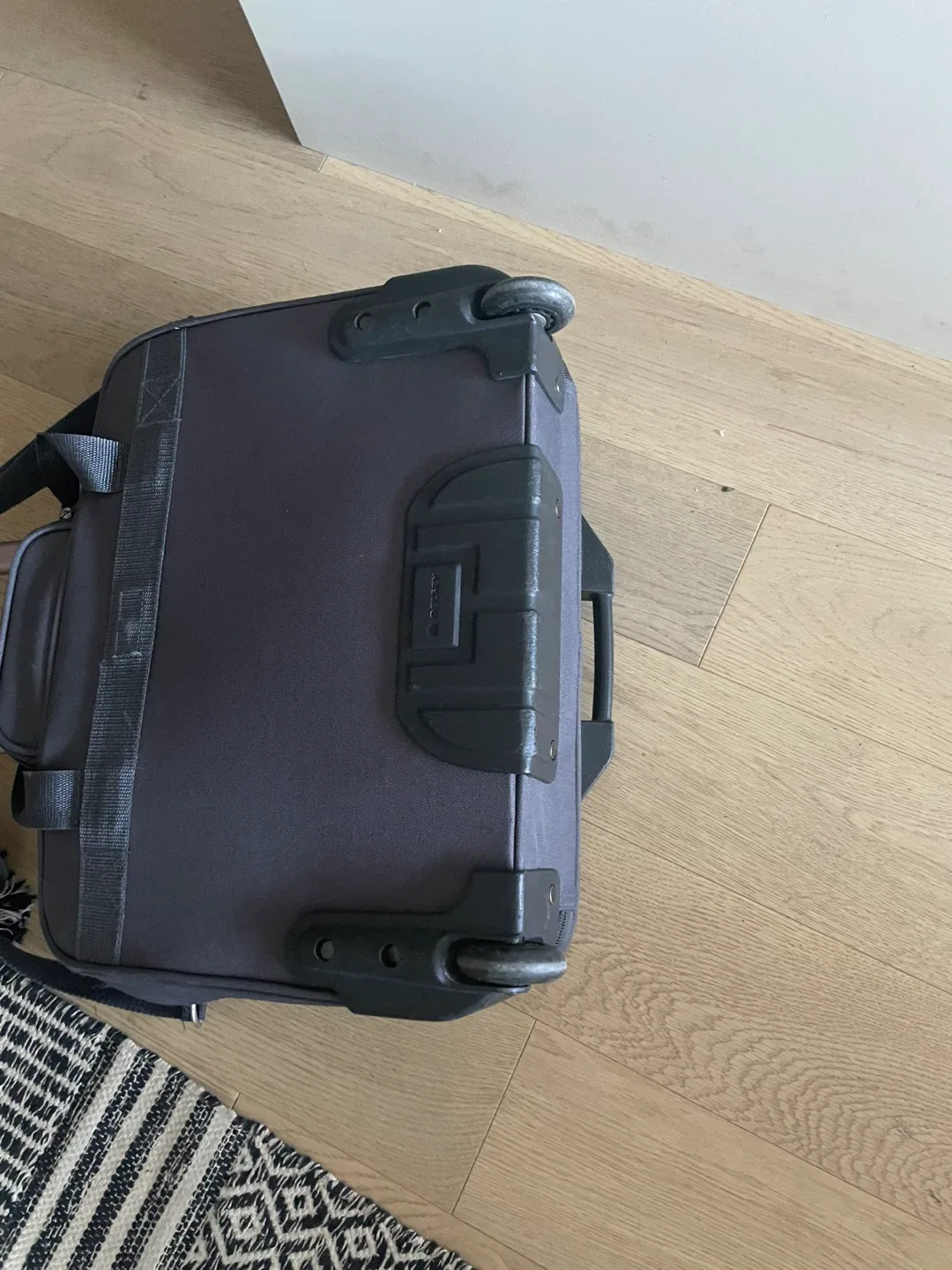 Delsey Rolling Carry-On Suitcase - Great Condition! image indicator(4)