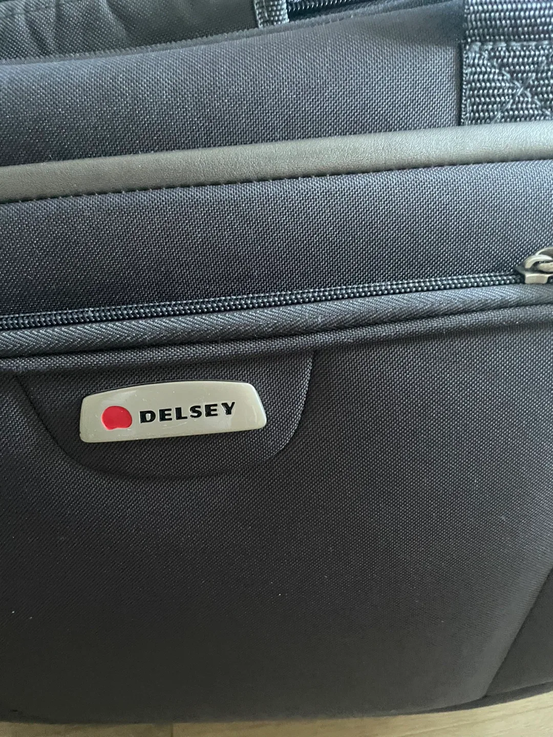 Delsey Rolling Carry-On Suitcase - Great Condition! image indicator(2)