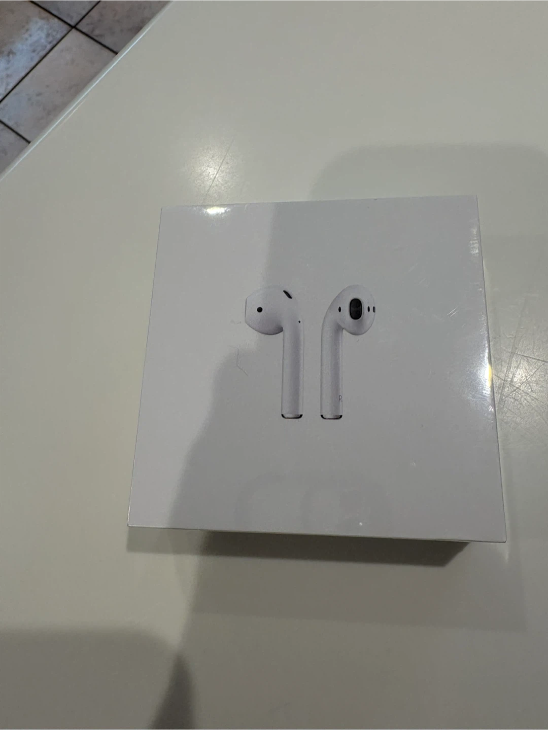New Apple AirPods with Charging Case (MV7N2AM/A)