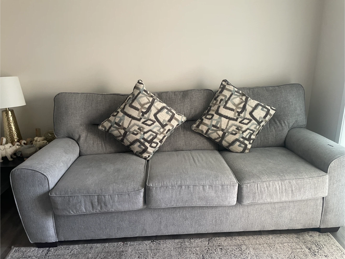 Grey Sofa with Cushions- Negotiable Rates