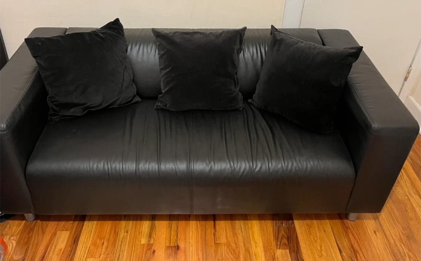 Black Leather Sofa with Pillows image indicator(2)