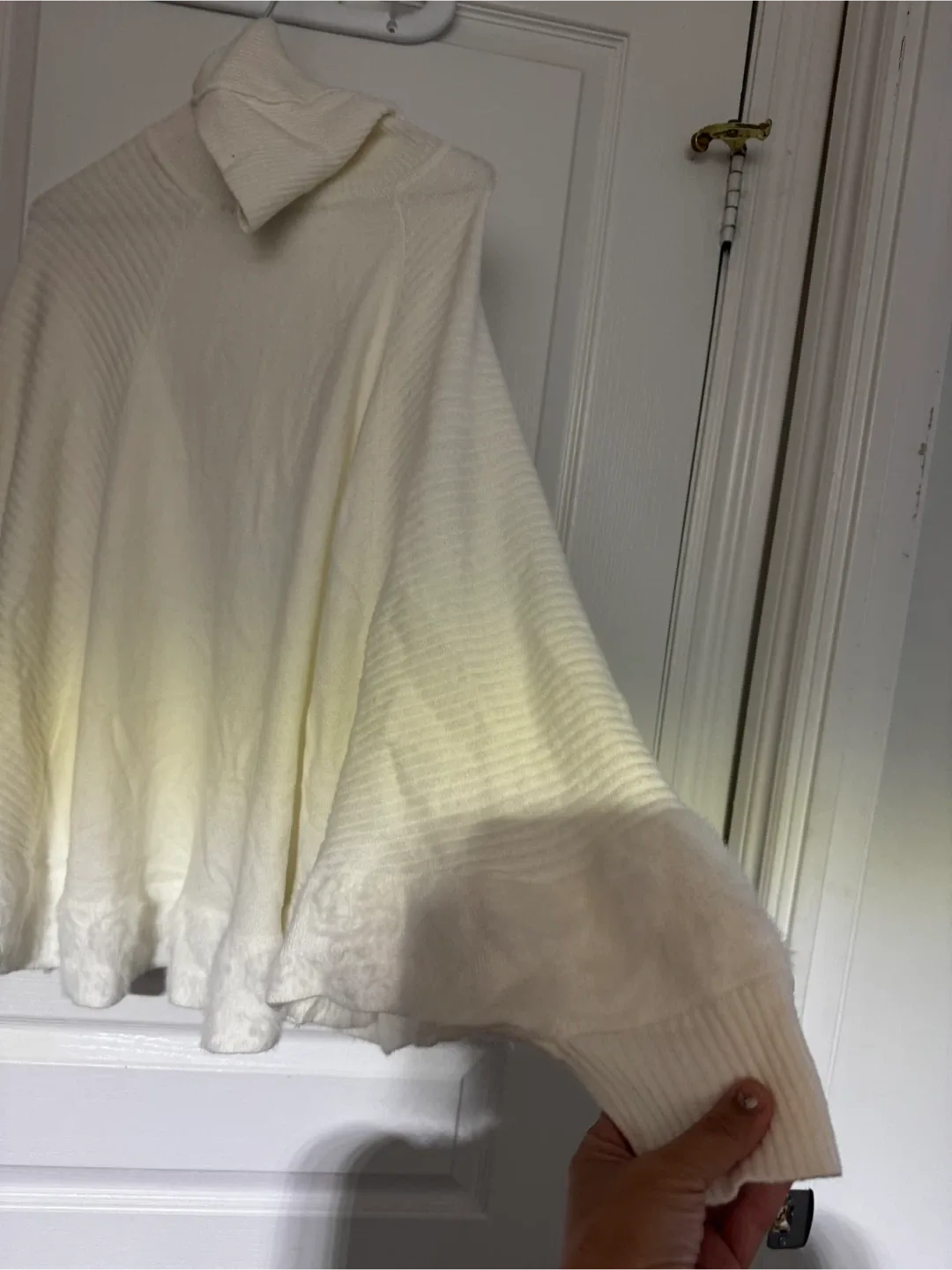 Cream Knit Poncho image indicator(2)