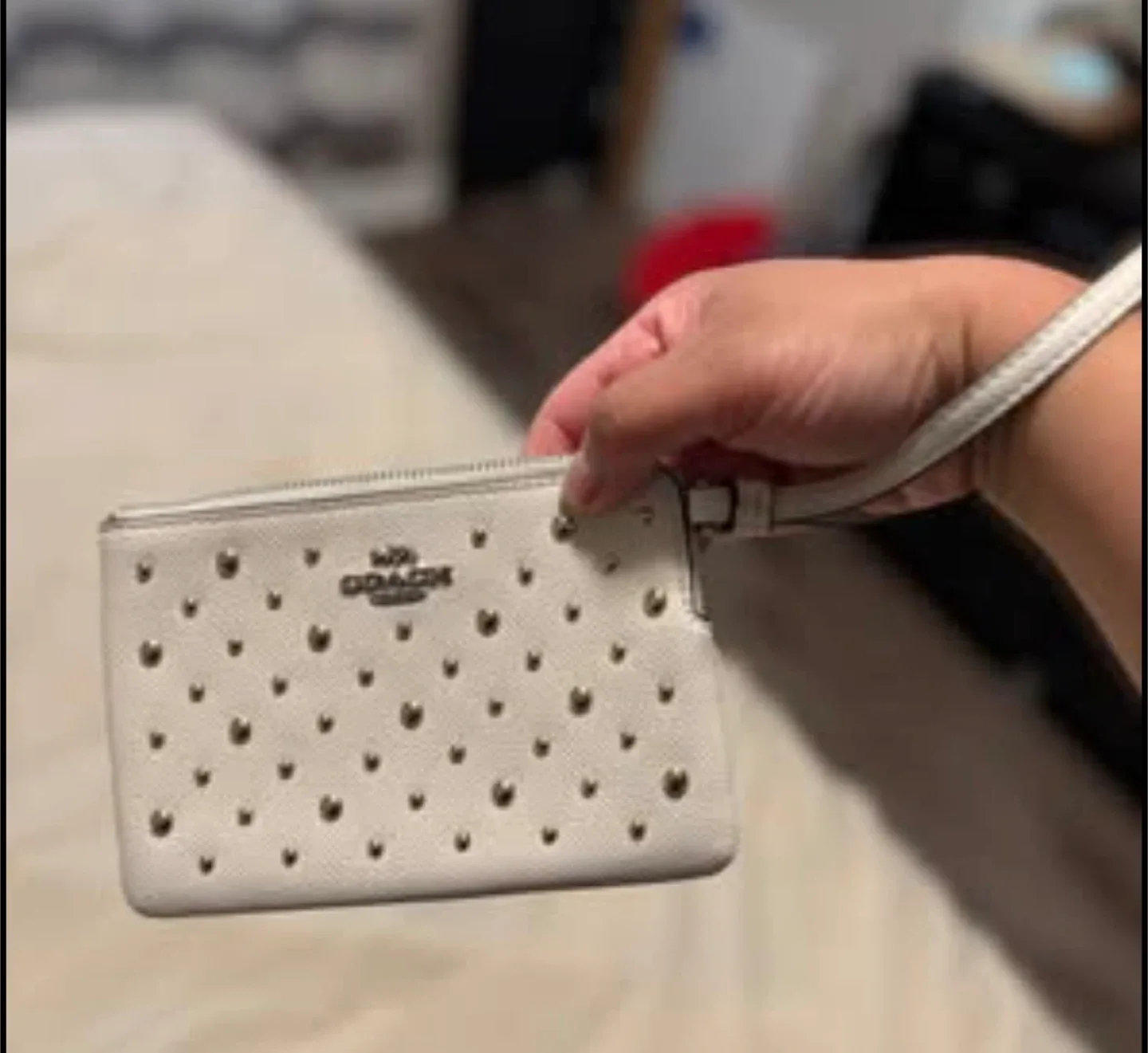 Coach Wristlet with Studs image indicator(3)