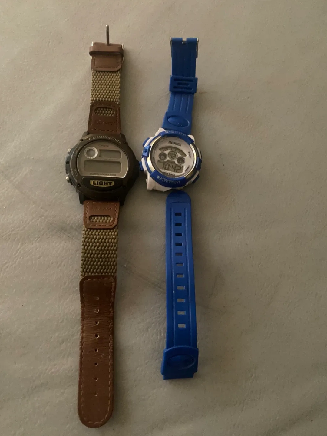 Two Assorted Digital Watches image indicator(2)