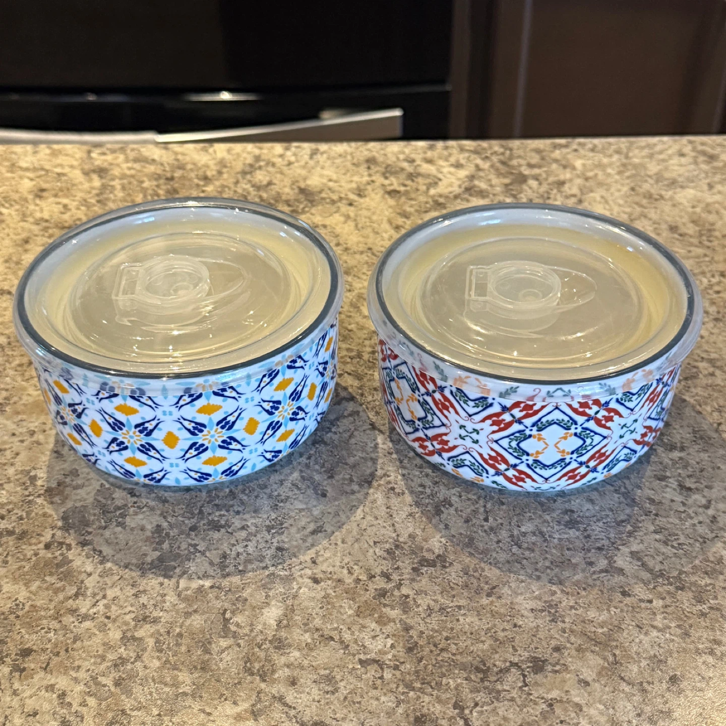 2 patterned ceramic food containers