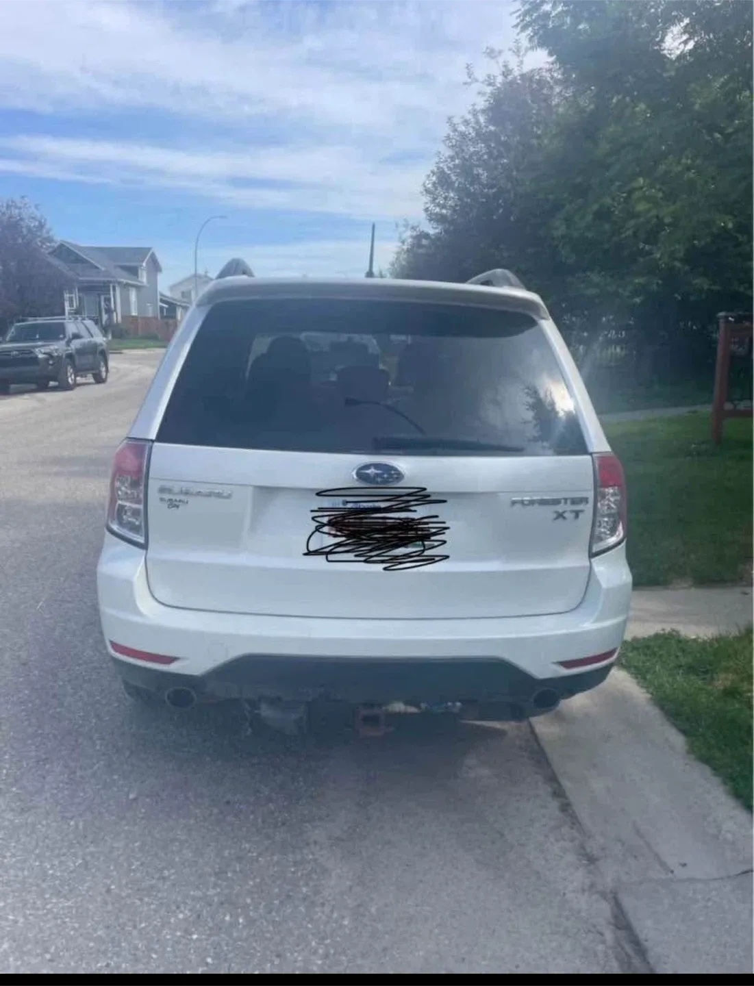 White Subaru Forester XT image indicator(4)