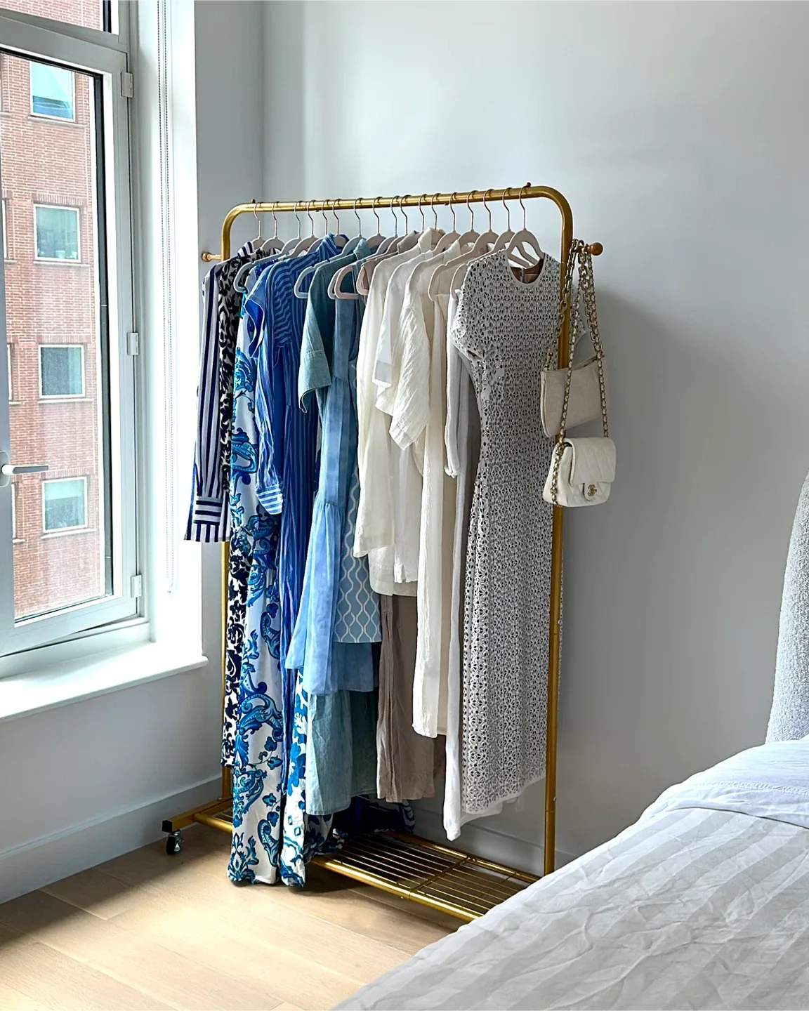 Gold Metal Rolling Garment Rack image indicator(2)