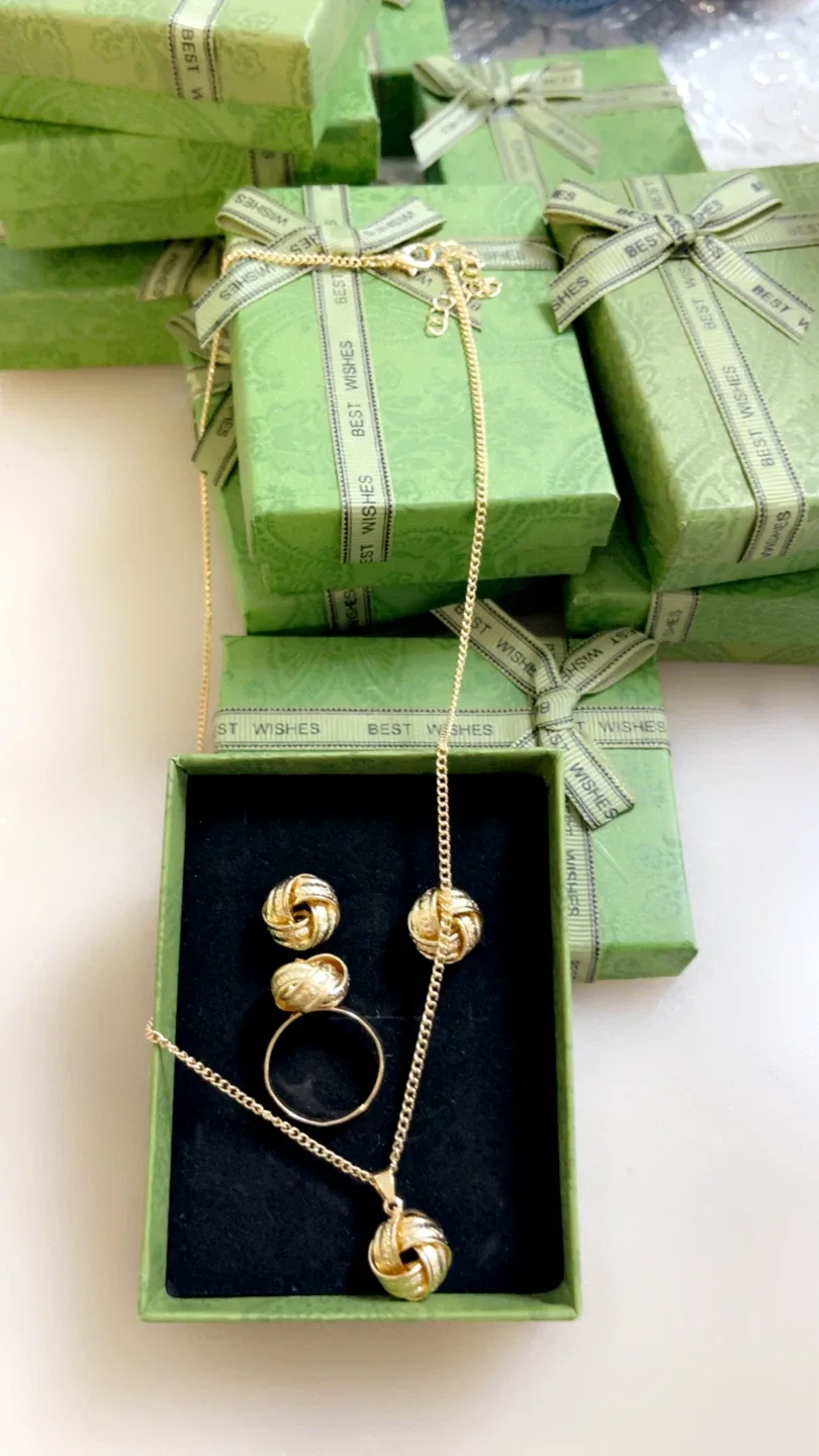 Gold Tone Knot Jewelry Set - Necklace, Ring, Earrings image indicator(3)
