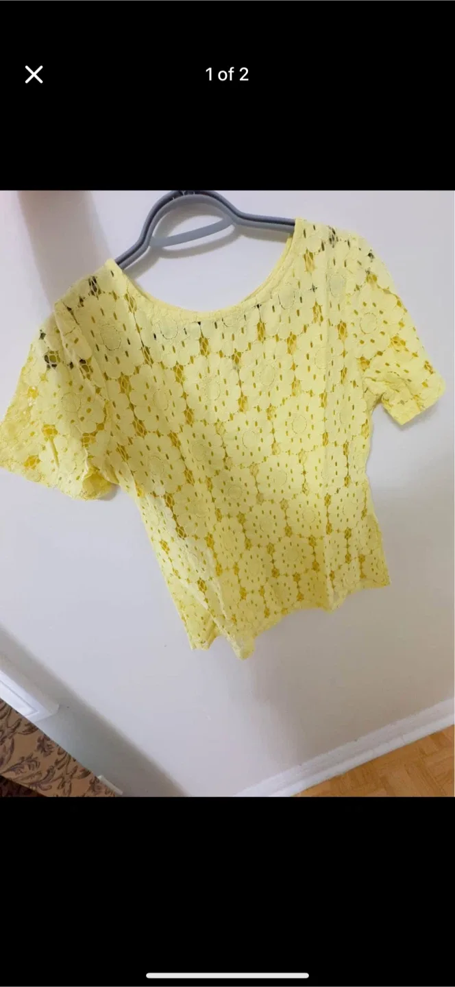 Assorted Women's Tops: Polo, Nike, More! image indicator(7)