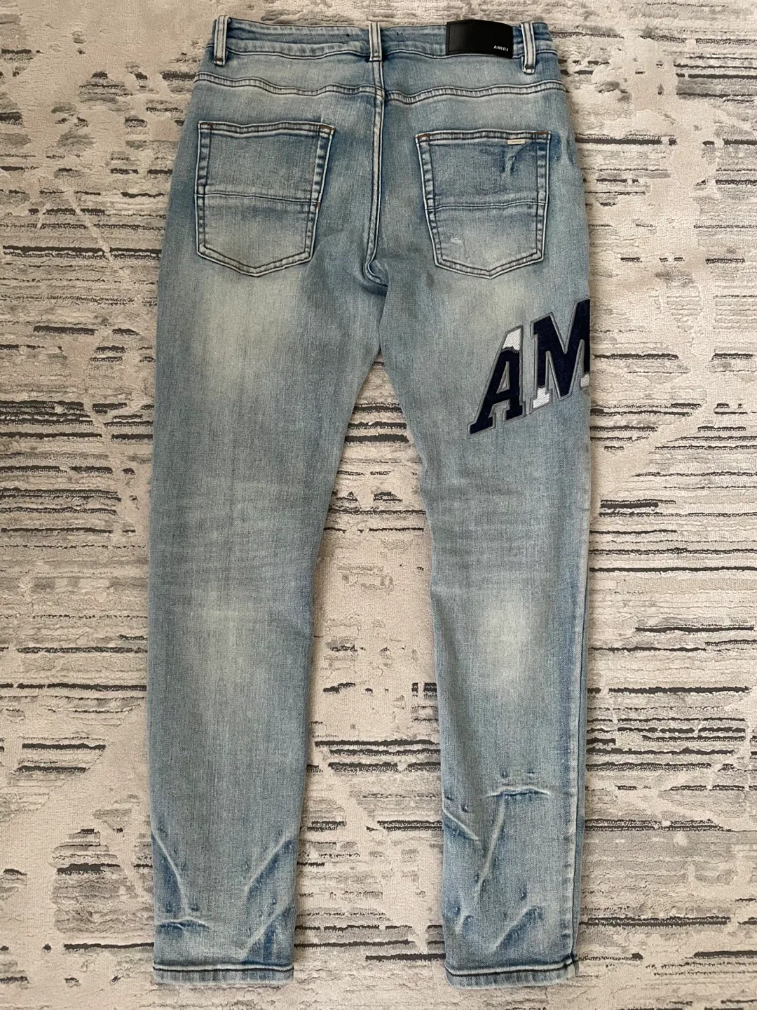 Amiri Ripped Jeans Blue image indicator(2)