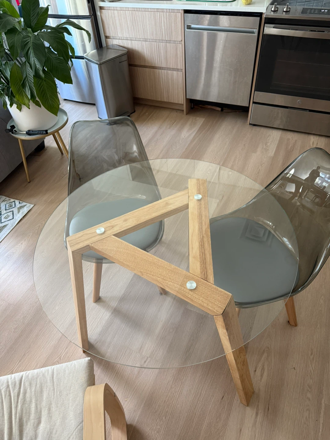 Round Glass Dining Table and Two Chairs