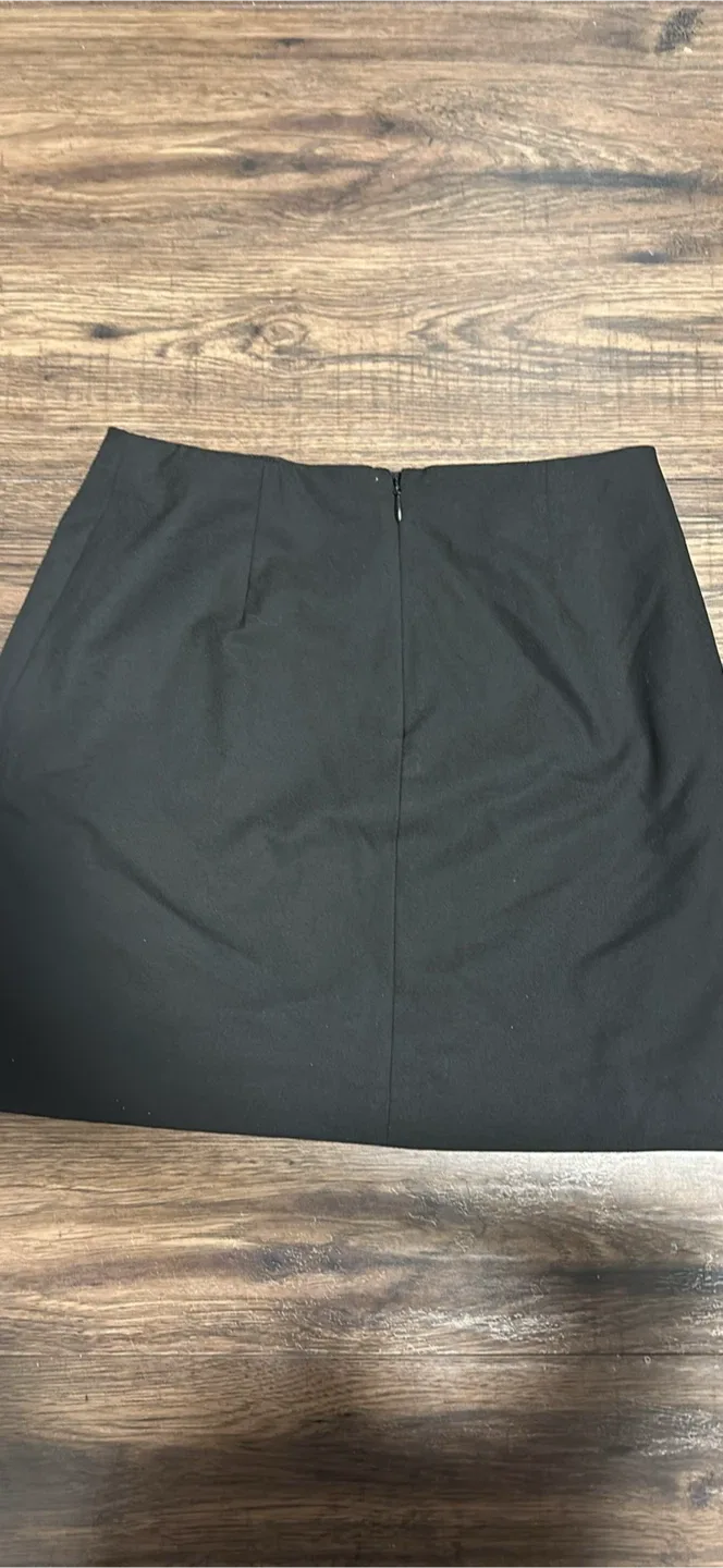 Aritzia black mini skirt image indicator(2)