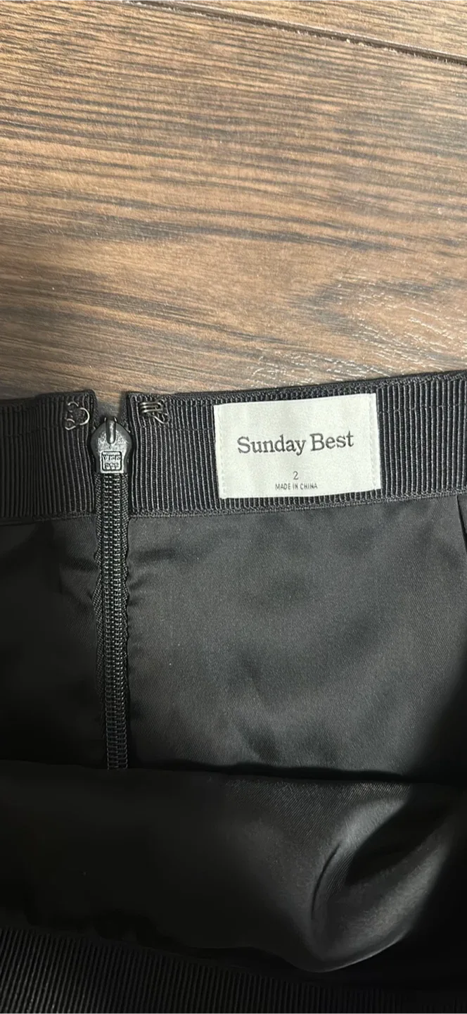 Aritzia black mini skirt image indicator(3)