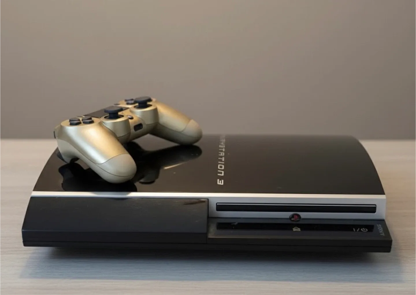 Sony PlayStation 3 (PS3) with a controller and a monitor screen image indicator(2)