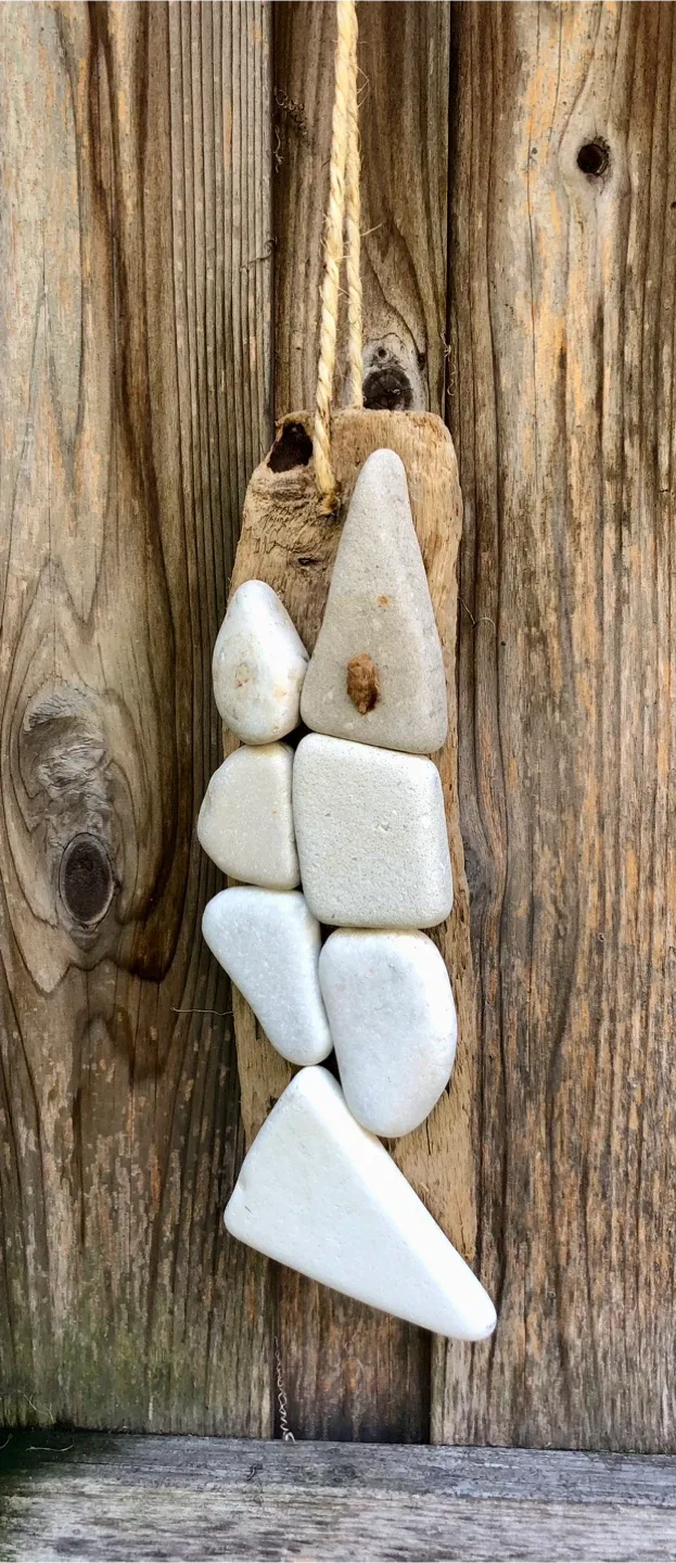 Art created by hand with driftwood and stone image indicator(2)