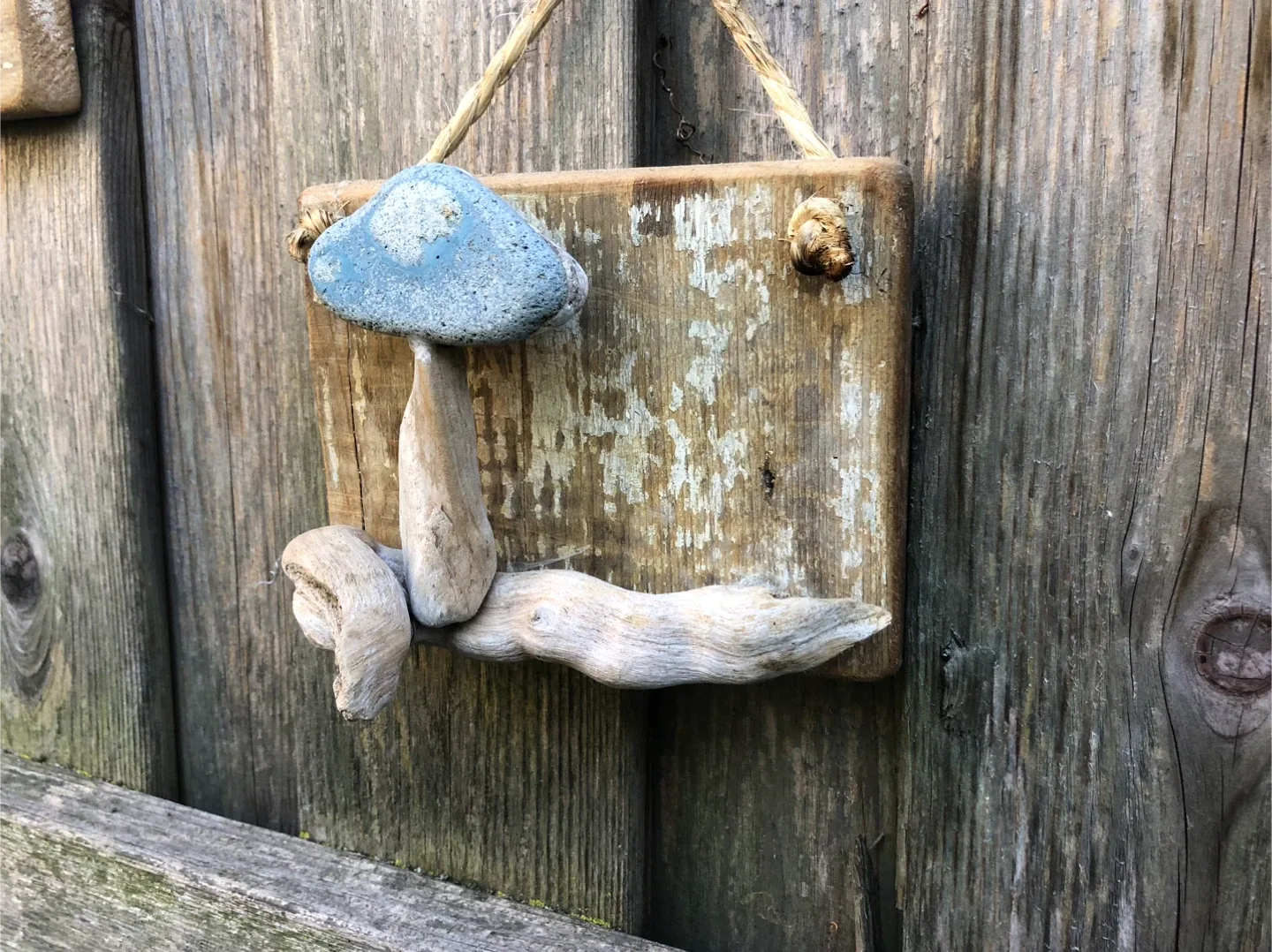 Art created by hand with driftwood and stone image indicator(8)