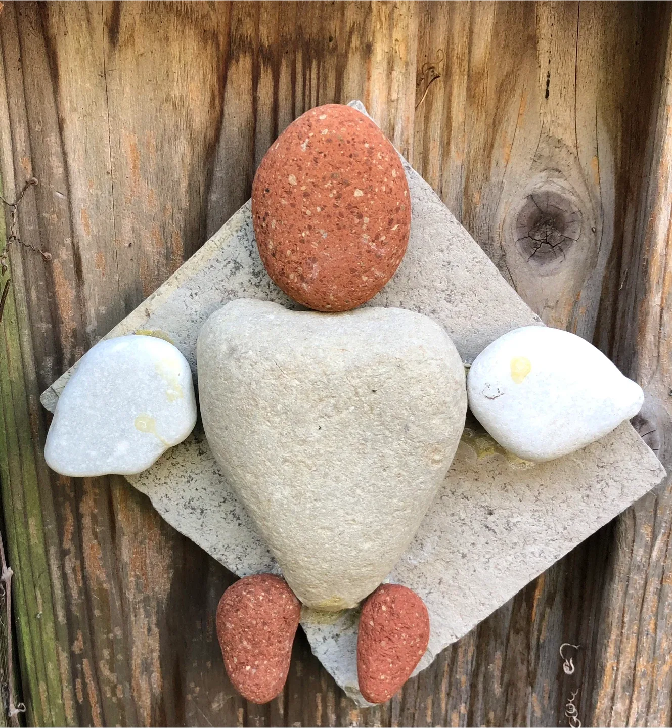 Art created by hand with driftwood and stone image indicator(4)