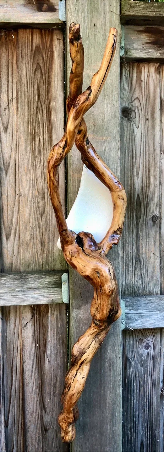 Art made of driftwood and stone image indicator(5)